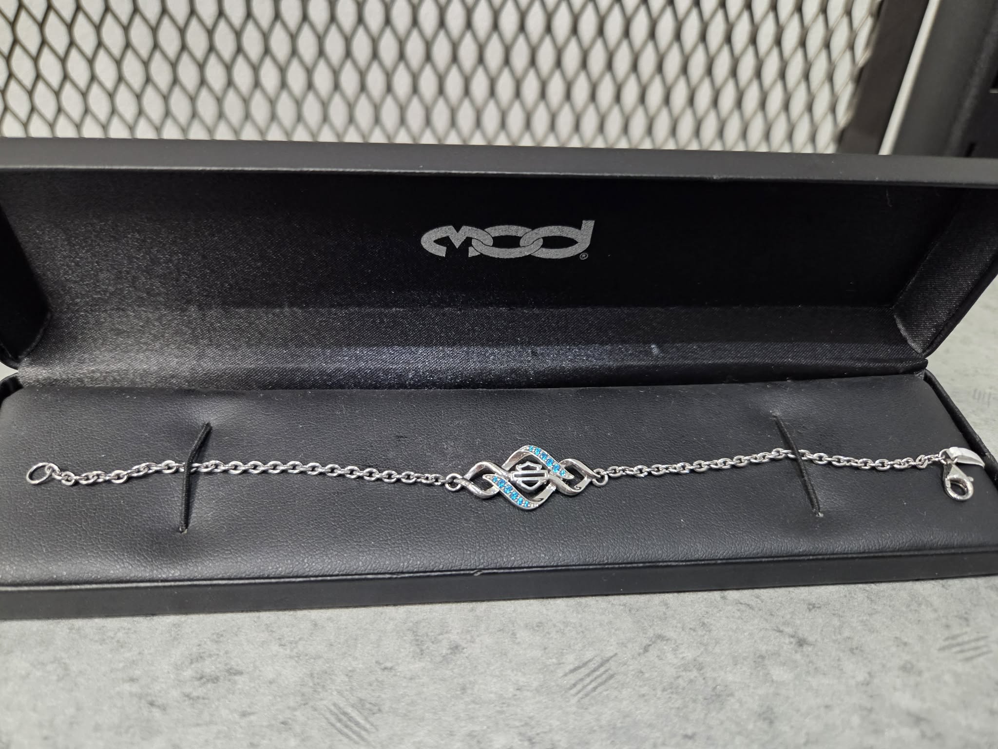 Licensed Product Womens Sterling Silver Interlock Blue Bling Stone Bracelet Main image
