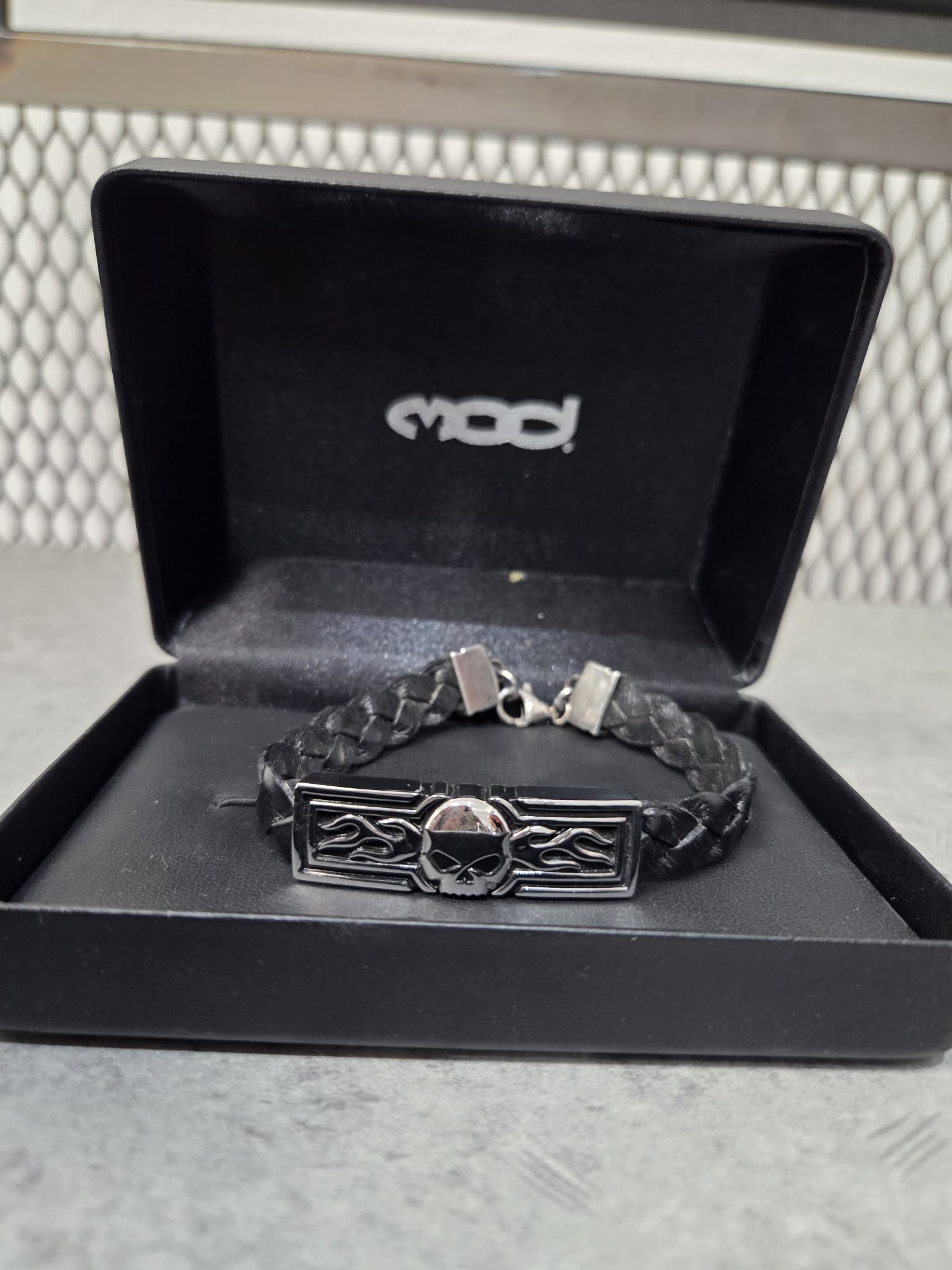 Licensed Product Mens Sterling Silver Flaming Skull Braided Leather Bracelet Main image